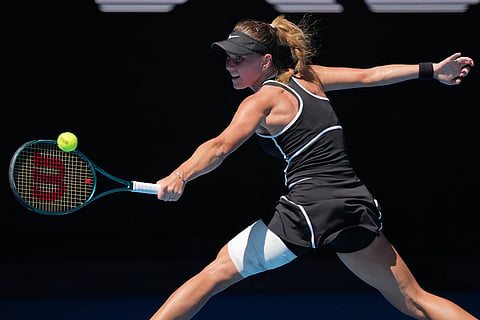Oksana Selekhmeteva of Russia plays a backhand return to Jessica Pegula of the U.S. during their third round match at the Australian Open tennis championship in Melbourne, Australia.