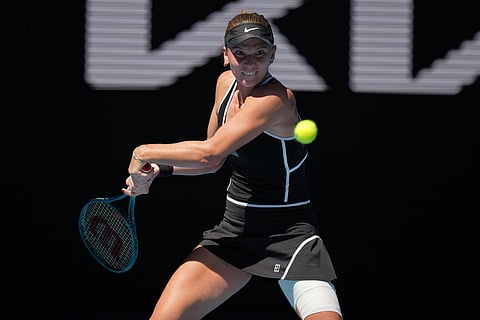 Oksana Selekhmeteva of Russia plays a backhand return to Jessica Pegula of the U.S. during their third round match at the Australian Open tennis championship in Melbourne, Australia.