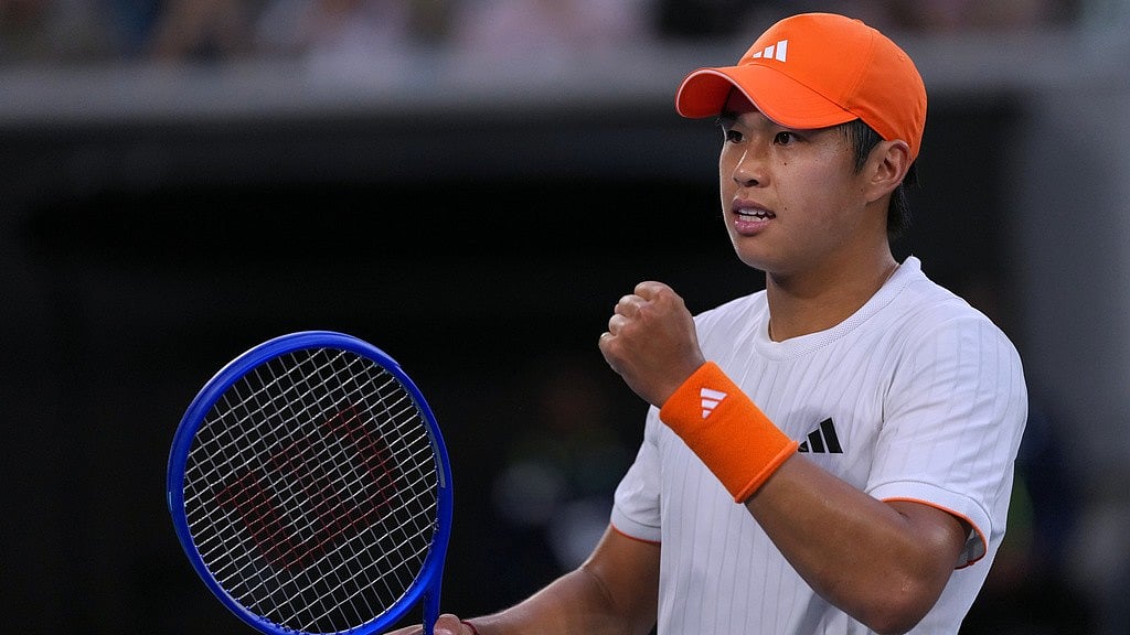 Photo: AP : Learner Tien of the U.S. celebrates after defeating Daniil Medvedev of Russia in their fourth round match at the Australian Open tennis championship in Melbourne.