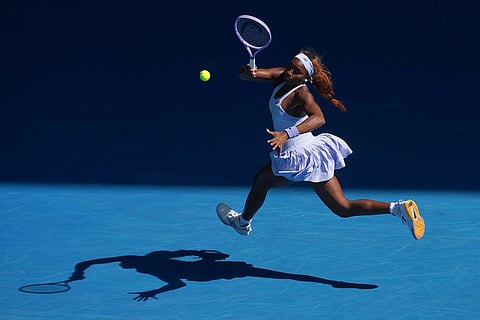 Coco Gauff of the U.S. plays a forehand return to Karolina Muchova of the Czech Republic during their fourth round match at the Australian Open tennis championship in Melbourne, Australia.