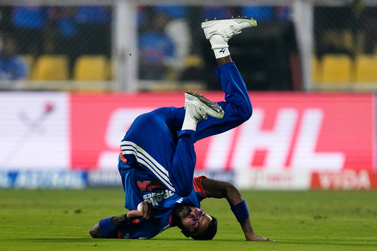 | Photo: AP/Anupam Nath : India's Hardik Pandya takes the catch to dismiss New Zealand's Devon Conway during the third T20 cricket match between India and New Zealand in Guwahati, India, Sunday, Jan. 25, 2026. 