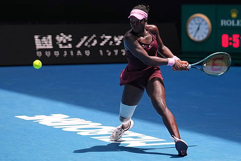 Victoria Mboko of Canada plays a backhand return to Aryna Sabalenka of Belarus during their fourth round match at the Australian Open tennis championship in Melbourne, Australia.