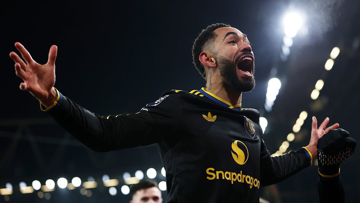 Matheus Cunha celebrates after scoring against Arsenal.