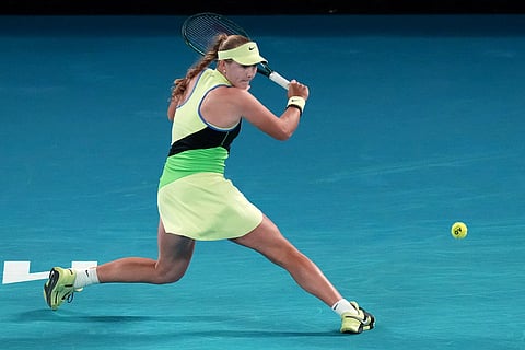 Mirra Andreeva of Russia plays a backhand return to Elina Svitolina of Ukraine during their fourth round match at the Australian Open tennis championship in Melbourne, Australia.