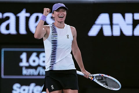 Iga Swiatek of Poland reacts during her third round match against Anna Kalinskaya of Russia at the Australian Open tennis championship in Melbourne, Australia.