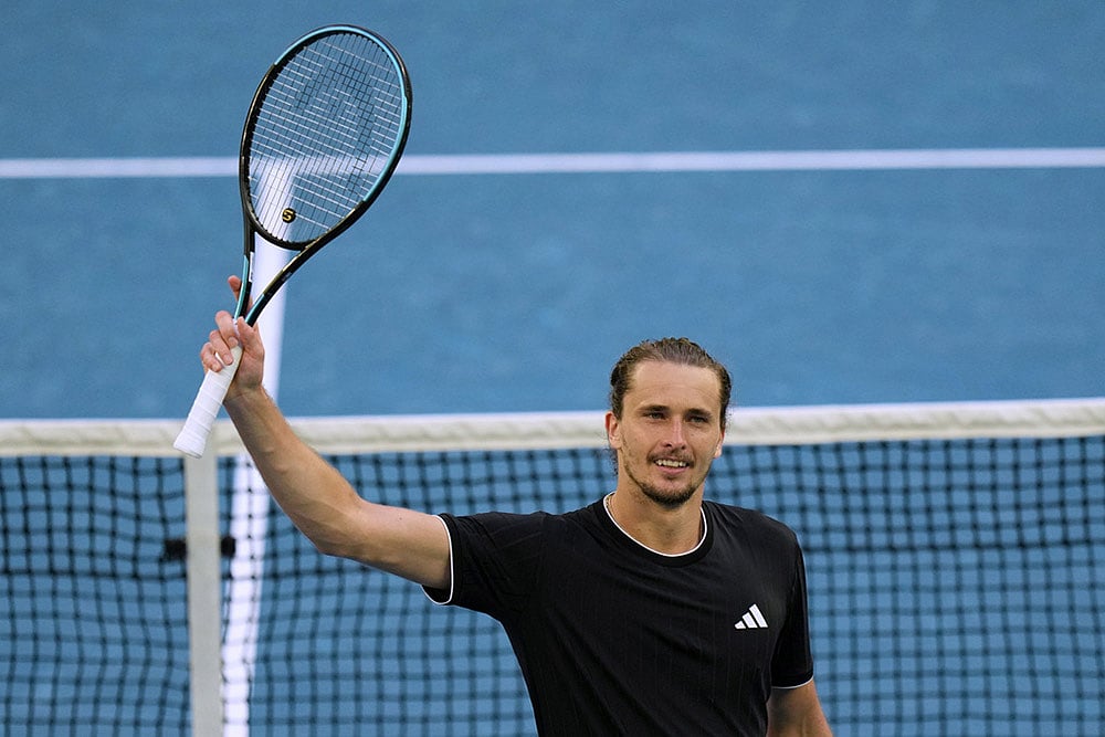 | Photo: AP/Dar Yasin : Alexander Zverev of Germany celebrates after defeating Francisco Cerundolo of Argentina in their fourth round match at the Australian Open tennis championship in Melbourne, Australia.