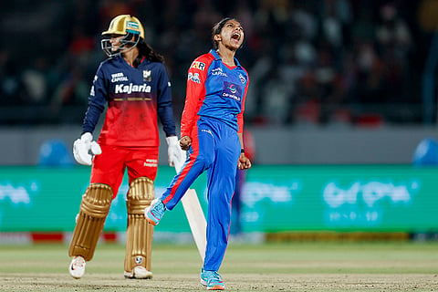 Delhi Capitals' Minnu Mani celebrates the wicket of Royal Challengers Bengaluru's Richa Ghosh during the Women's Premier League (WPL) 2026 T20 cricket match between Royal Challengers Bengaluru and Delhi Capitals, at BCA Stadium, in Vadodara, Gujarat.