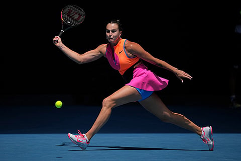 Aryna Sabalenka of Belarus plays a forehand return to Victoria Mboko of Canada during their fourth round match at the Australian Open tennis championship in Melbourne, Australia.