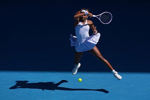 Coco Gauff of the U.S. plays a forehand return to Karolina Muchova of the Czech Republic during their fourth round match at the Australian Open tennis championship in Melbourne, Australia.