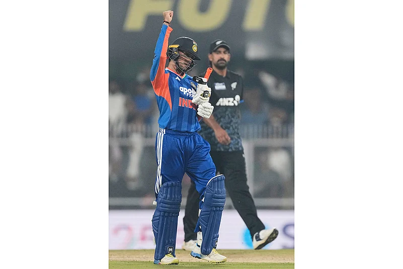 Indias Abhishek Sharma celebrates after scoring fifty runs