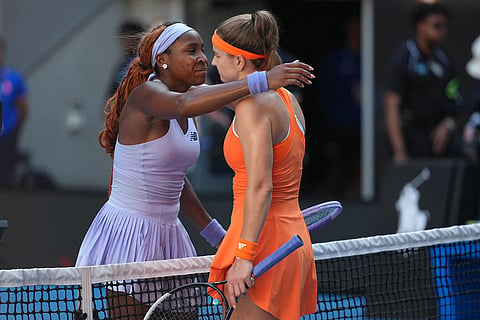 Coco Gauff, left, of the U.S. is congratulated by Karolina Muchova, right, of the Czech Republic following their fourth round match at the Australian Open tennis championship in Melbourne, Australia.