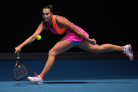 Aryna Sabalenka of Belarus plays a forehand return to Victoria Mboko of Canada during their fourth round match at the Australian Open tennis championship in Melbourne, Australia.