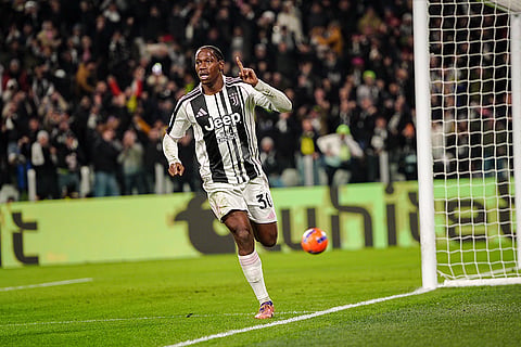 Juventus' Jonathan David celebrates scoring their side's first goal of the game during the Italian Serie A soccer match between Juventus and Napoli in Turin, Italy.