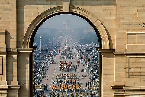 A view of the marching contingents during the 77th Republic Day Parade, as seen through the India Gate, at Kartavya Path, in New Delhi. 