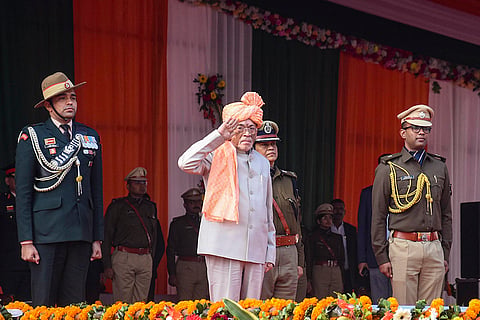 Jharkhand Governor Santosh Gangwar takes salute during the 77th Republic Day Parade, in Ranchi.