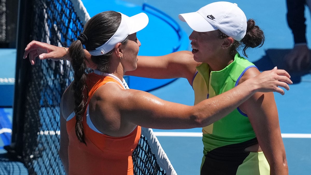AP : Jessica Pegula, left, of the U.S., is congratulated by her compatriot Madison Keys after winning their fourth round match at the Australian Open tennis championship