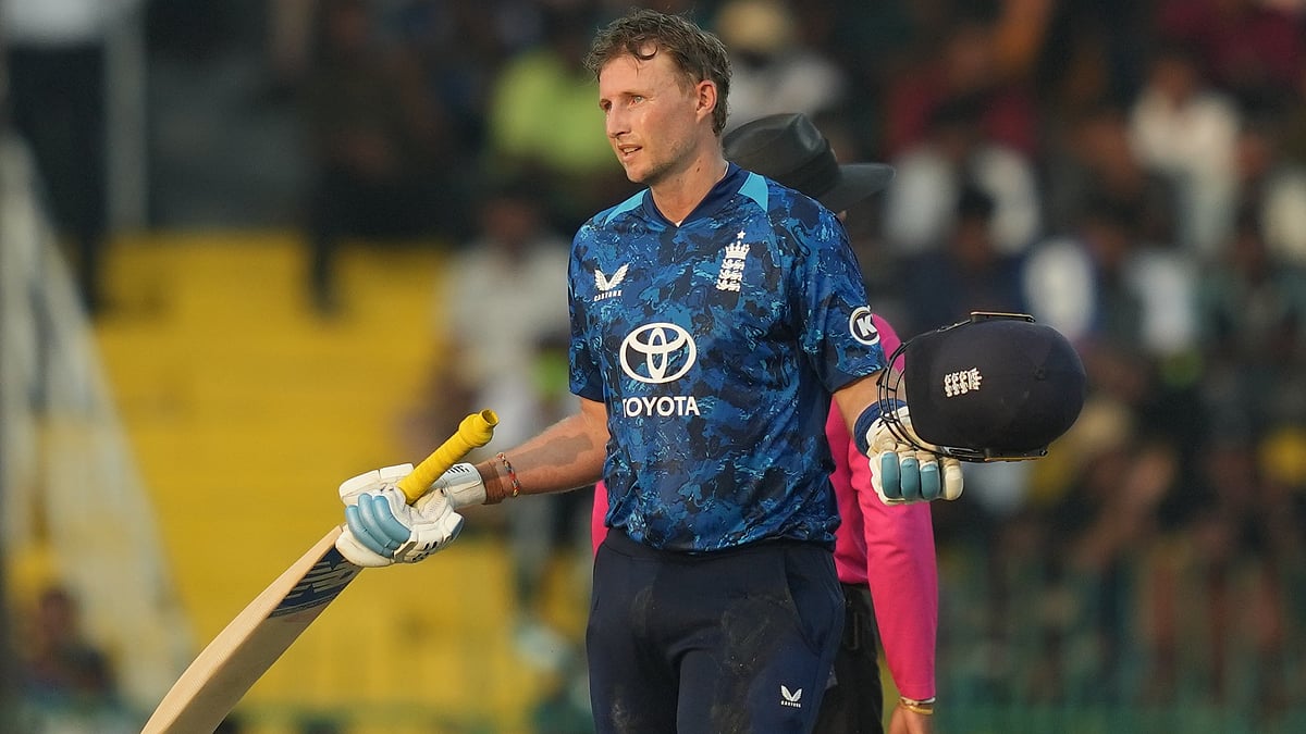 (AP Photo/Eranga Jayawardena) : England's Joe Root celebrates his century during the third ODI cricket match between England and Sri Lanka in Colombo, Sri Lanka, Tuesday, Jan. 27, 2026