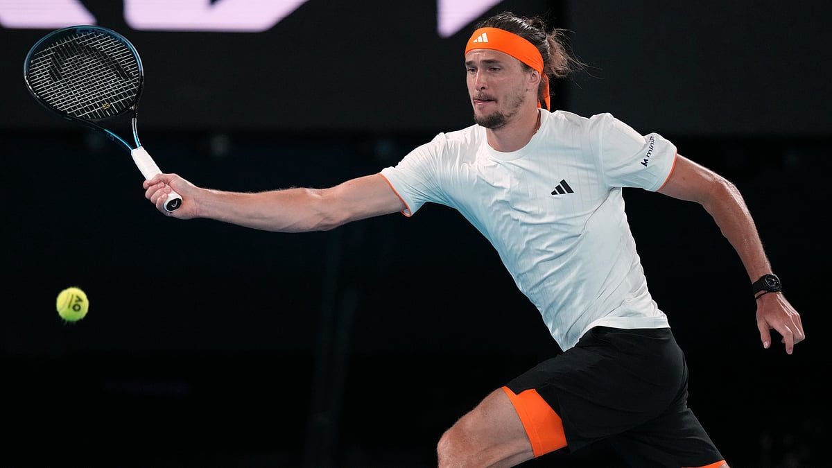 AP/Aaron Favila : Zverev in action against Tien in their quarter-final match at the Australian Open 2026.