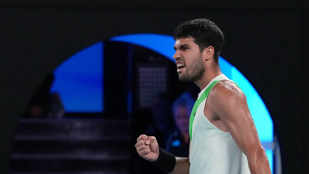 | Photo: AP/Asanka Brendon Ratnayake : Carlos Alcaraz of Spain reacts during his quarterfinal match against Alex de Minaur of Australia at the Australian Open tennis championship in Melbourne, Australia, Tuesday, Jan. 27, 2026. 
