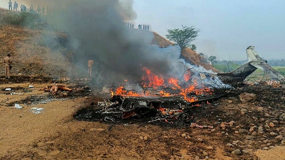 | Photo: PTI : Maharashtra Deputy Chief Minister Ajit Pawar's plane in flames after it crashed during landing, at Baramati in Pune district, Maharashtra. Pawar, along with three others on board, was killed in the crash. 