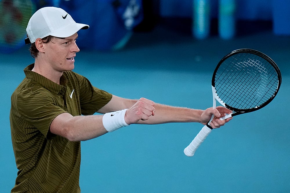 | Photo: AP/Dar Yasin : Jannik Sinner of Italy reacts after defeating Ben Shelton of the U.S. in their quarterfinal match at the Australian Open tennis championship in Melbourne, Australia.