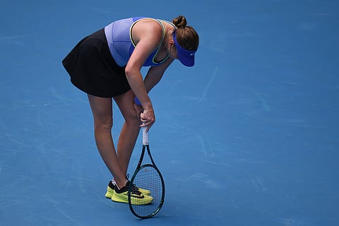Amanda Anisimova of the U.S. reacts during her quarterfinal match agains compatriot Jessica Pegula at the Australian Open tennis championship in Melbourne, Australia.