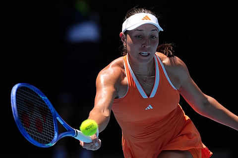 Jessica Pegula of the U.S. plays a forehand return to compatriot Amanda Anisimova during their quarterfinal match at the Australian Open tennis championship in Melbourne, Australia.
