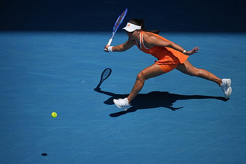 Jessica Pegula of the U.S. plays a forehand return to compatriot Amanda Anisimova during their quarterfinal match at the Australian Open tennis championship in Melbourne, Australia.