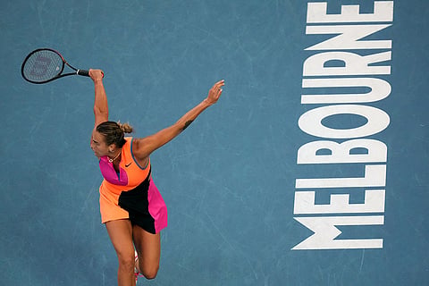 Aryna Sabalenka of Belarus plays a backhand return to Elina Svitolina of Ukraine during their semifinal match at the Australian Open tennis championship in Melbourne, Australia.