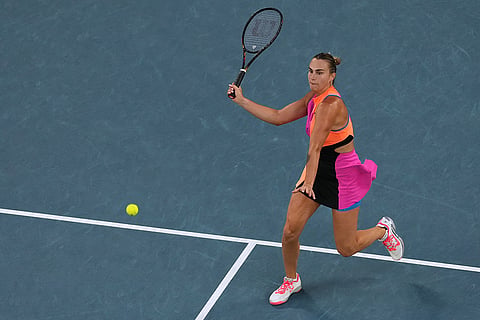 Aryna Sabalenka of Belarus plays a forehand return to Elina Svitolina of Ukraine during their semifinal match at the Australian Open tennis championship in Melbourne, Australia.