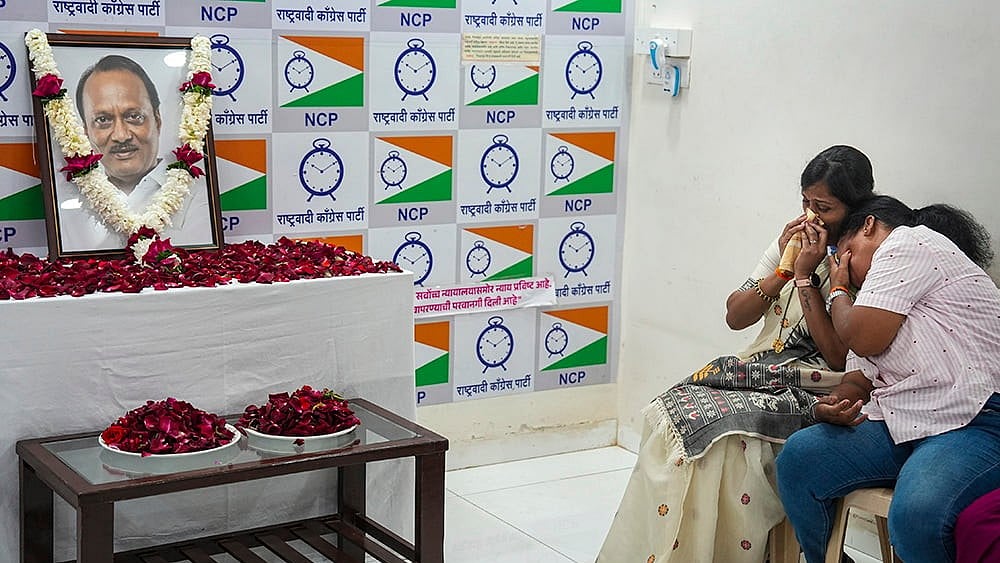 | Photo: PTI/Shashank Parade : Mumbai: NCP workers mourn the death of party leader and Maharashtra Deputy Chief Minister Ajit Pawar, at the party office in Mumbai. Pawar and four others were killed after an aircraft carrying them crashed near Baramati on Wednesday. 
