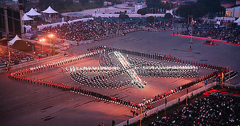 Armed forces personnel form a 'Tri-Service' formation during the Beating Retreat ceremony, marking the conclusion of Republic Day celebrations, at Vijay Chowk, in New Delhi. 