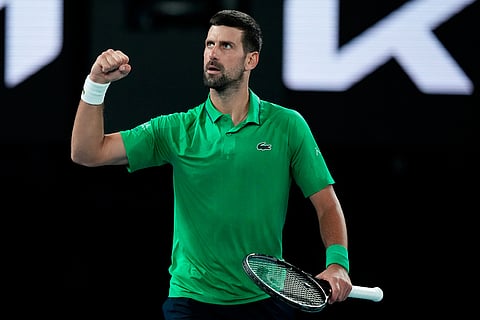 Novak Djokovic of Serbia reacts during his semifinal match against Jannik Sinner of Italy at the Australian Open tennis championship in Melbourne, Australia.
