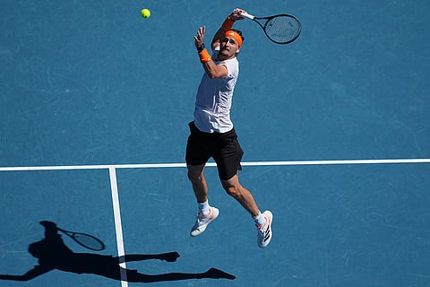 Alexander Zverev of Germany plays a forehand return to Carlos Alcaraz of Spain during their semifinal match at the Australian Open tennis championship in Melbourne, Australia.