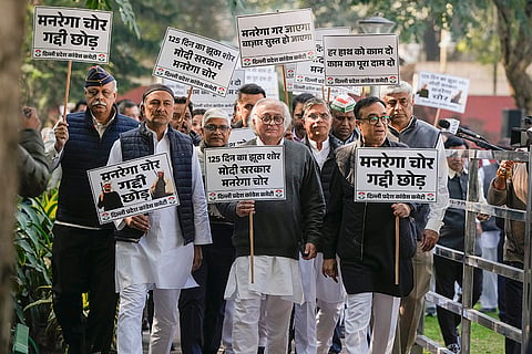 Congress leaders Jairam Ramesh, Ajay Maken, Pawan Khera and others take part in a protest rally under 'MGNREGA Bachao Sangram', in New Delhi.
