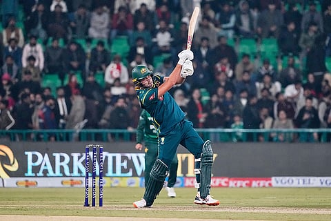 Australia's Xavier Bartlett plays a shot during the first T20 cricket match between Pakistan and Australia, in Lahore, Pakistan.