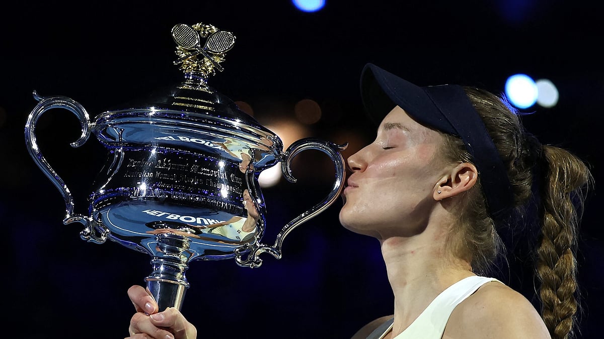 AustralianOpen/X : Elena Rybakina celebrating with the Australian Open 2026 title.