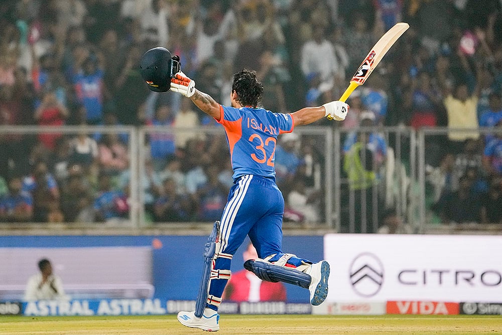 | Photo: PTI/R SenthilKumar : India's Ishan Kishan celebrates his century during the fifth and final T20 International cricket match between India and New Zealand, at the Greenfield International Stadium, in Thiruvananthapuram, Kerala.