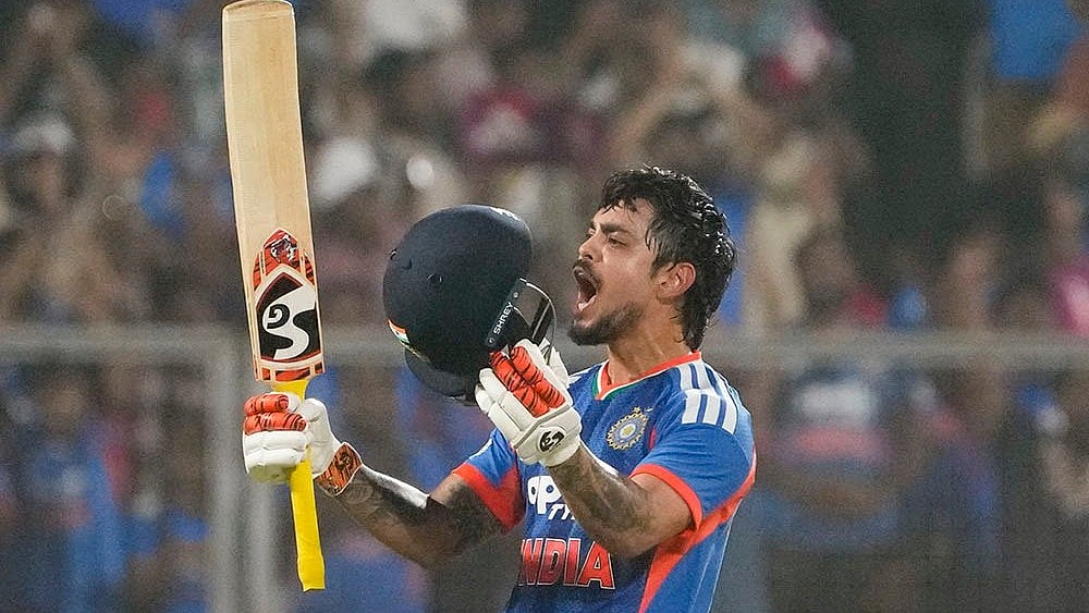 | Photo: PTI/R SenthilKumar : India's Ishan Kishan celebrates his century during the fifth and final T20 International cricket match between India and New Zealand, at the Greenfield International Stadium, in Thiruvananthapuram.