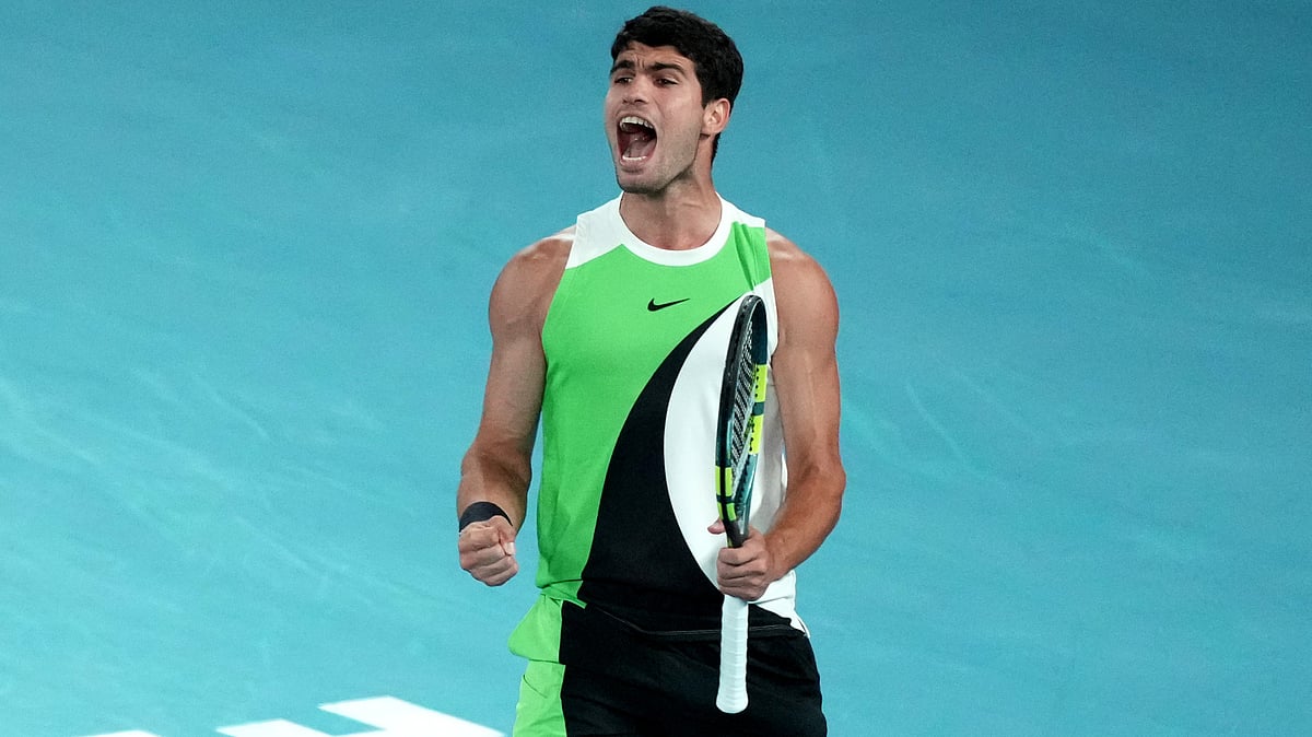 (AP Photo/Mark Baker) : Carlos Alcaraz of Spain reacts during the men's singles final match against Novak Djokovic of Serbia at the Australian Open tennis championship in Melbourne, Australia, Sunday, Feb. 1, 2026