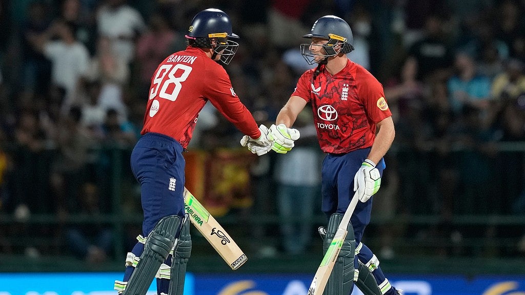 Photo: AP : Tom Banton (left) and Jos Buttler in action during the second T20I between England and Sri Lanka in Pallekele, Sri Lanka.