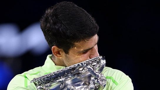 carlosalcaraz/X
 : Carlos Alcaraz with the Australian Open 2026 title. 