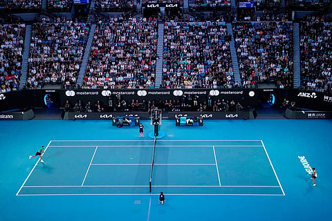 Novak Djokovic of Serbia, left, and Carlos Alcaraz of Spain play in their final match at the Australian Open tennis championship in Melbourne, Australia.