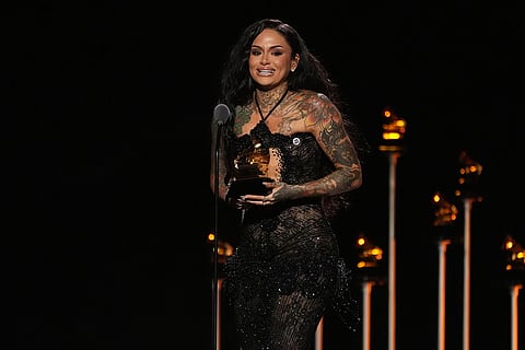Kehlani accepts the award for best R&B performance for "Folded" during the 68th annual Grammy Awards in Los Angeles. 