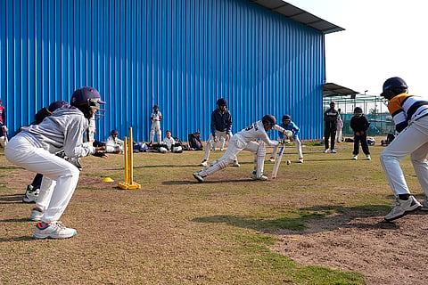 Young boys and girls practising together at Nagesh Gupta's academy. 