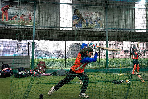 One of the girls practicing in the nets with other female students at Nagesh Gupta's academy in Zirakhpur. 