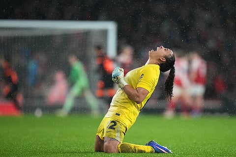 Corinthian's goalkeeper Leticia celebrates after teammate Vic Albuquerque scored their side's second goal from the penalty spot during the Women's Champions Cup final soccer match between Arsenal FC and SC Corinthians in London.