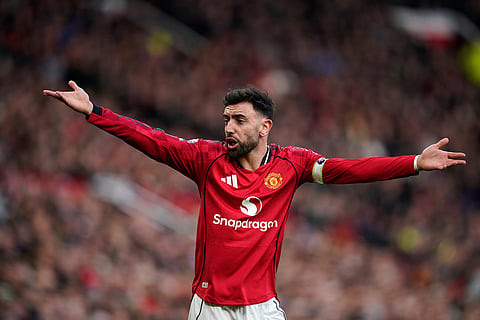 Manchester United's Bruno Fernandes reacts during the English Premier League soccer match between Manchester United and Fulham in Manchester, England.