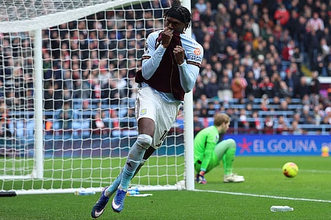 Aston Villa's Tammy Abraham celebrates scoring their side's first goal of the game but is ruled out due to VAR during the English Premier League soccer match between Aston Villa and Brentford, in Birmingham, England.