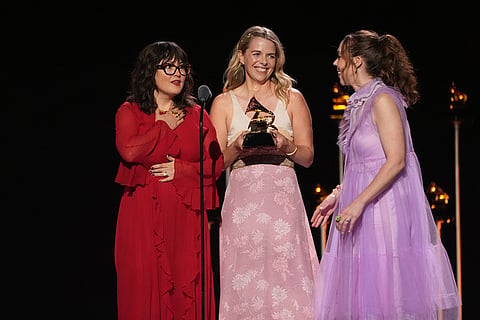 Sara Watkins, from left, Aoife O'Donovan, and Sarah Jarosz of I'm With Her accept the award for best folk album for "Wild and Clear and Blue" during the 68th annual Grammy Awards in Los Angeles. 